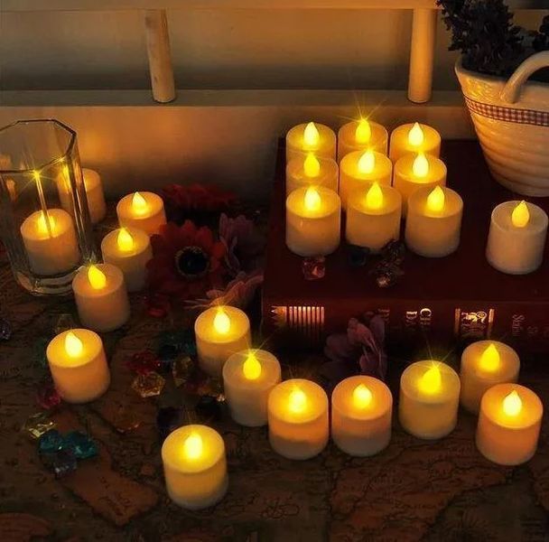Набір електронних світлодіодних свічок на батарейках, 24 шт 50924 фото