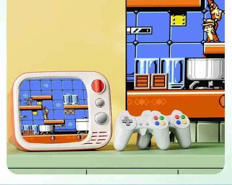 Ігрова портативна консоль H7 Mini TV РЕТРО з монітором 3.5" + два джойстики (740 ігор) SaleMarket m16356 фото